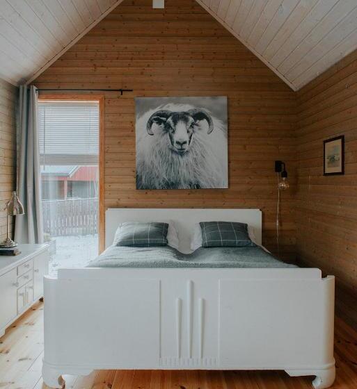 豪华房间, Husfrua Gårdshotell