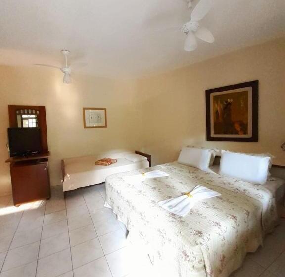 חדר סטנדרט לשלושה עם נוף לגינה, Pousada E Spa Canto Do Mar