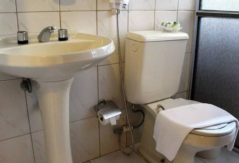 庭の見えるスタンダードトリプルルーム, Pousada E Spa Canto Do Mar