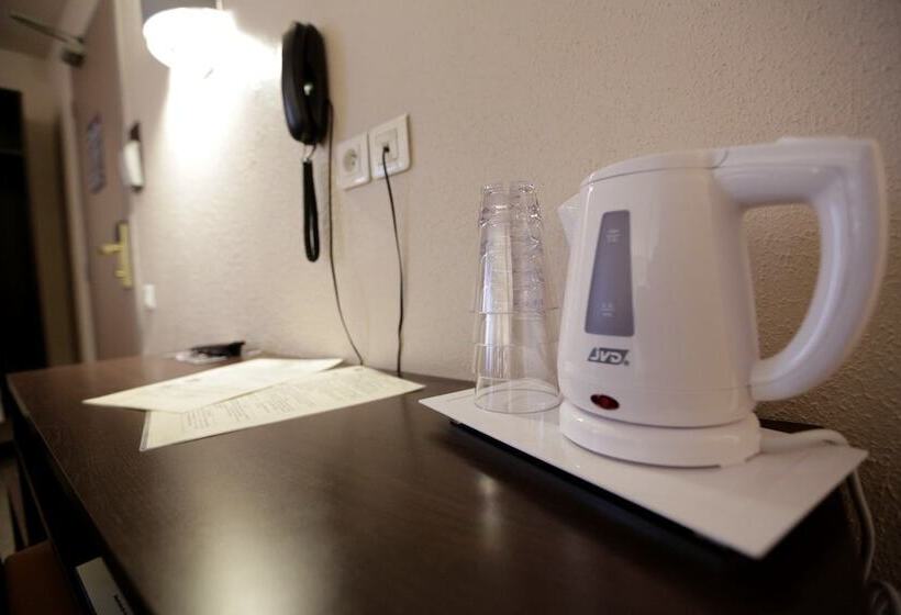 غرفة قياسية, Au Petit Caporal