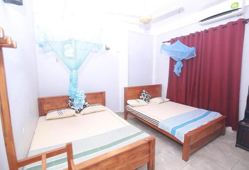 غرفة عائلية, Ari Guest House