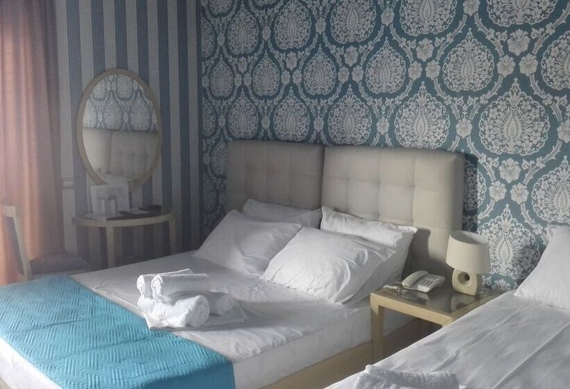 غرفة قياسية ثلاثية, Feevos