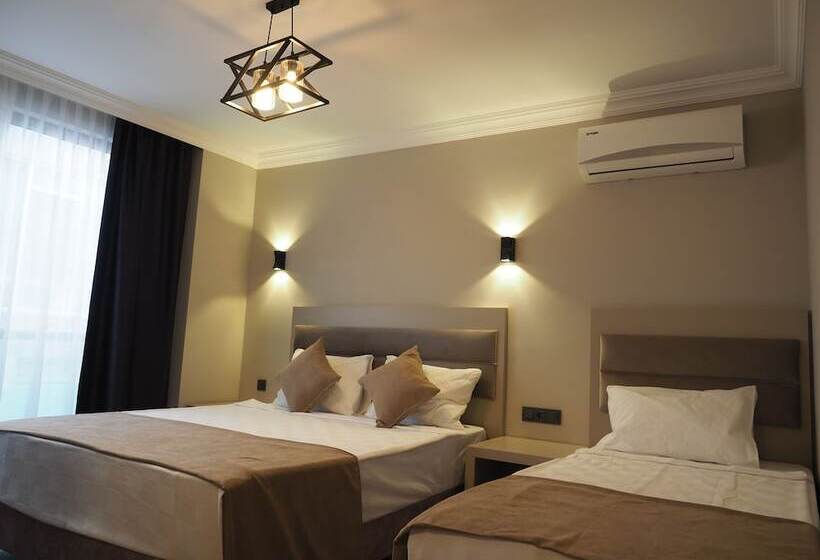 标准三人间, Zenia