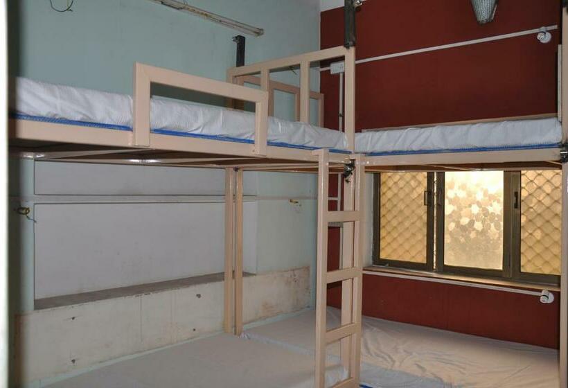 سرير فى غرفة مشتركه, Ganga Fuji Home