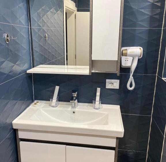 Habitació Triple Deluxe, Augusto Rooms