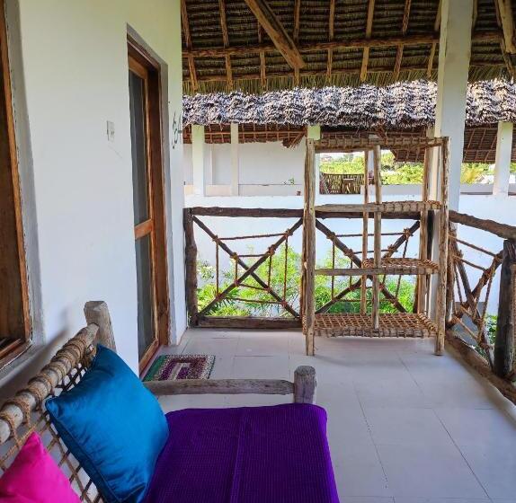 オーシャンビューデラックスルームバルコニー付き, Secret Place Hotel By Hello Tanzania Tours& Safaris