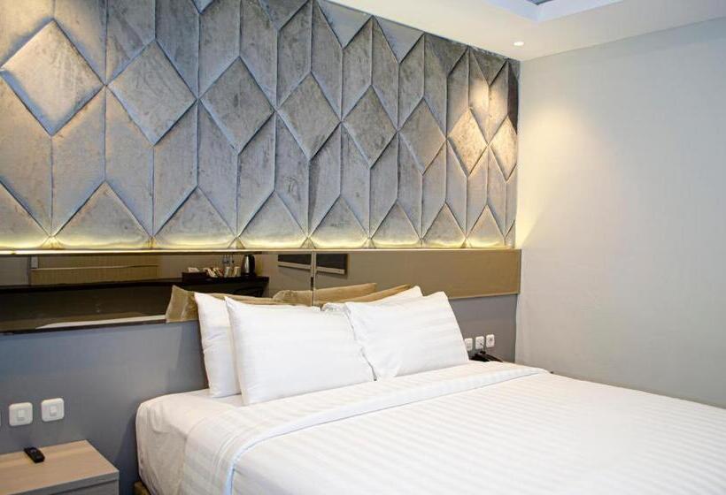 キングサイズベッドのデラックスルーム, Arcadia Hotel Manado