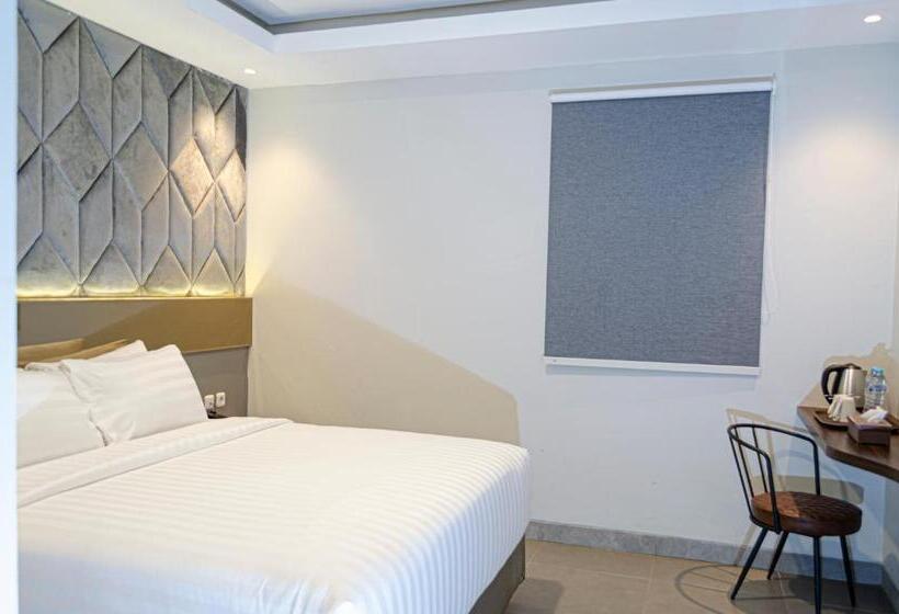 キングサイズベッドのデラックスルーム, Arcadia Hotel Manado