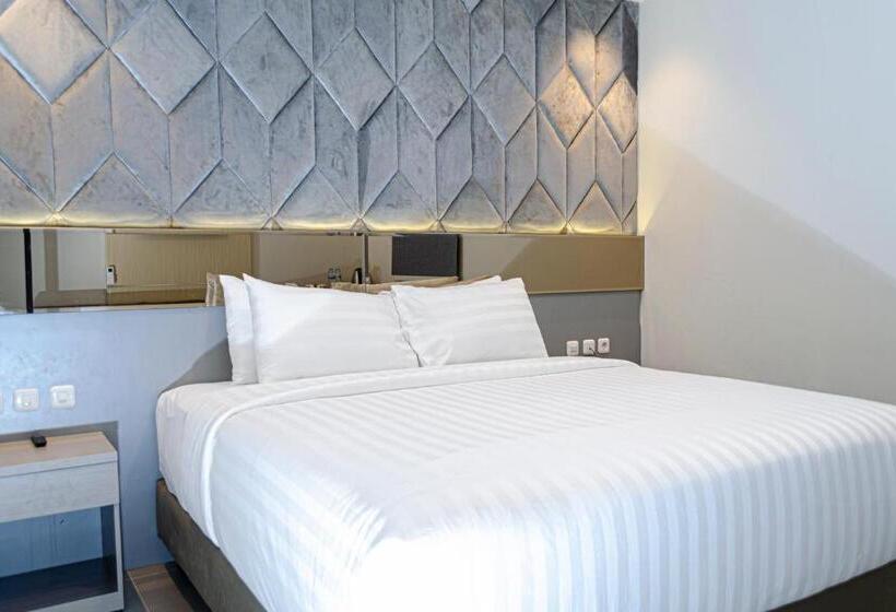 キングサイズベッドのデラックスルーム, Arcadia Hotel Manado