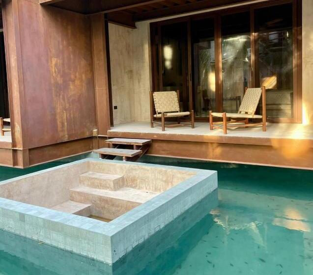 מיטת קינג בסוויטה, Awa Holbox Hotel Boutique Beach Front