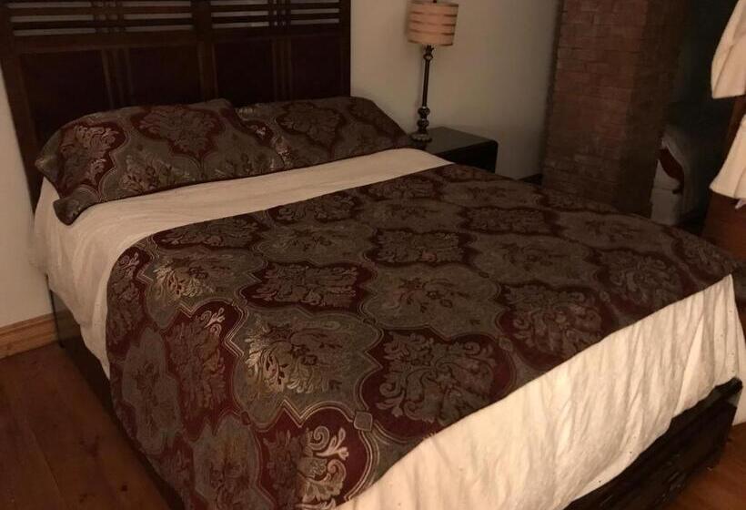 庭の見えるスタンダードトリプルルーム, Le Gîte Du Lac à La Tortue