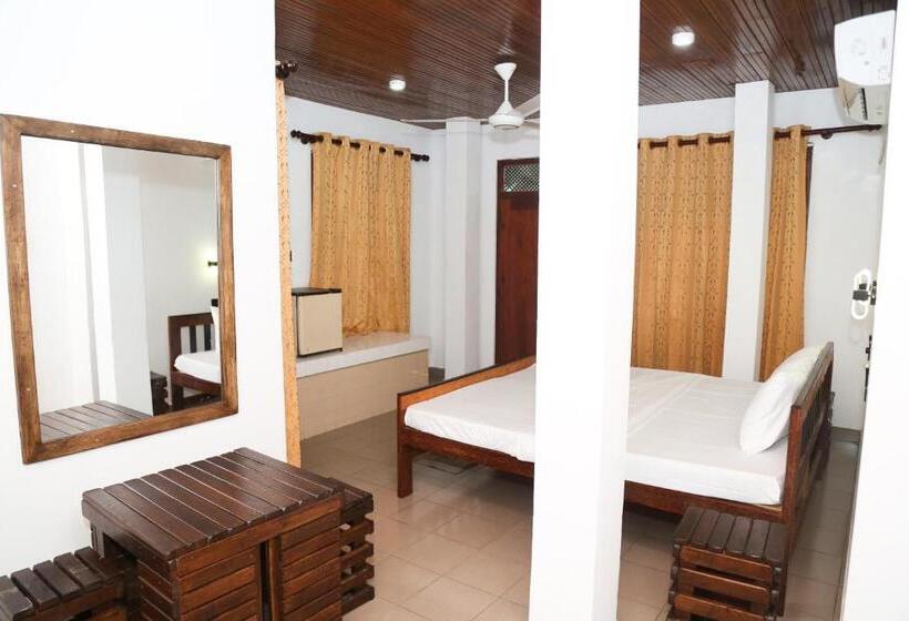 Quarto Familiar Vista Jardim, Wave Crest Residence
