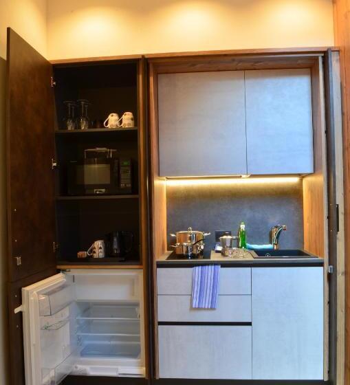 غرفة قياسية رباعية مزودة بشُرفة, Aria Alpina Guest House Affittacamere