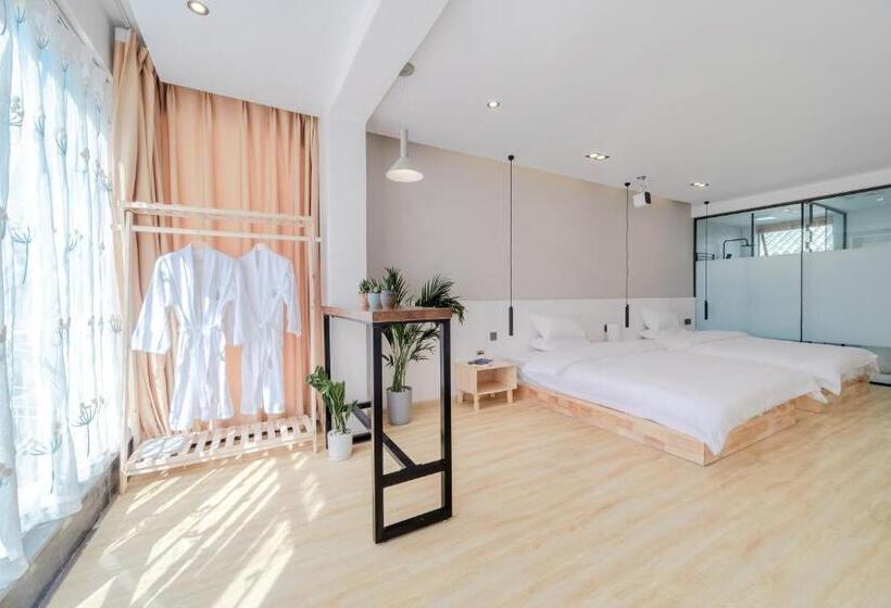 غرفة ديلوكس عائلية, Shangri La Jinwushe Boutique Inn