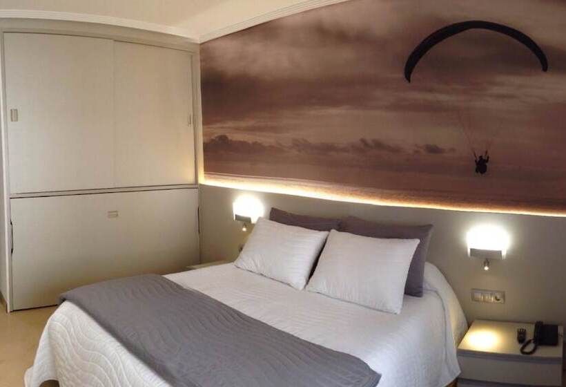 标准三人间, Vila Da Guarda