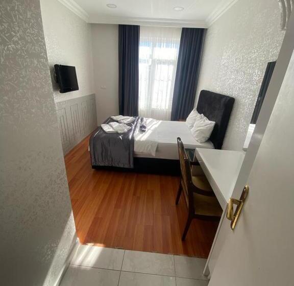 غرفة ديلوكس, Timex Suites