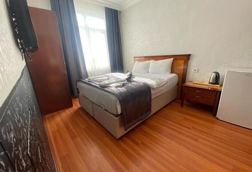 غرفة ديلوكس, Timex Suites