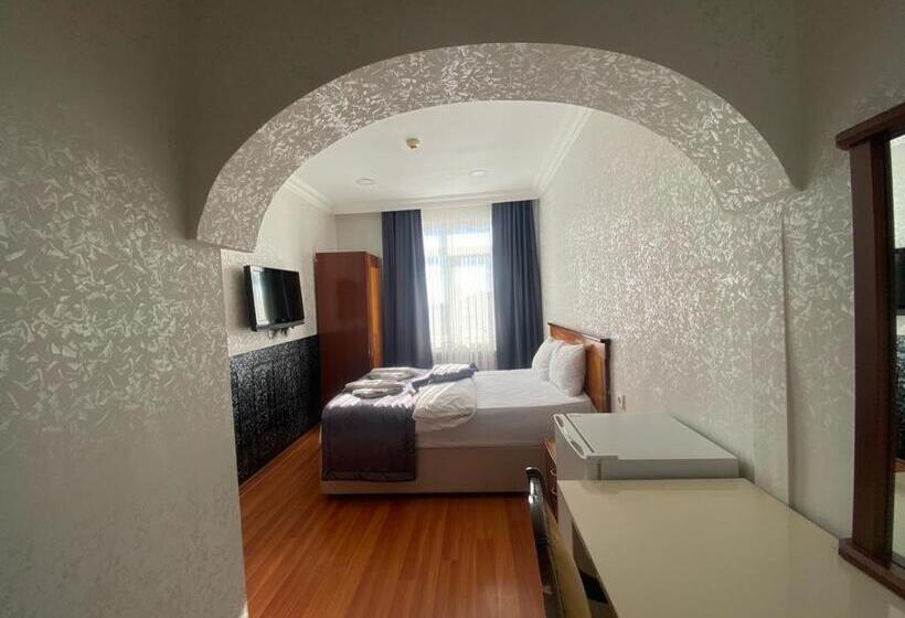 غرفة ديلوكس, Timex Suites