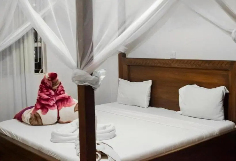 キングサイズベッドのデラックスルーム, Kilimanjaro Vines Retreat Hotel Mdawi