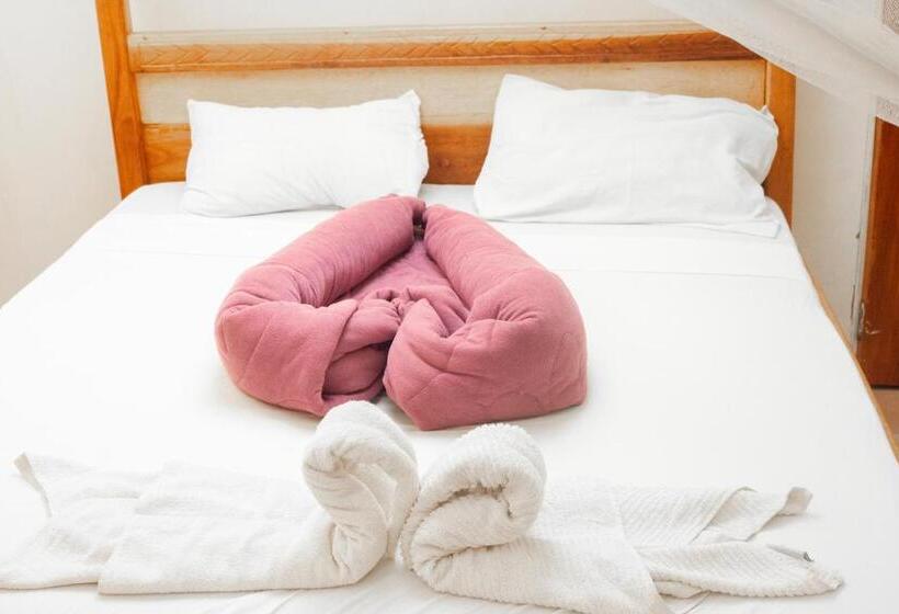 キングサイズベッドのデラックスルーム, Kilimanjaro Vines Retreat Hotel Mdawi