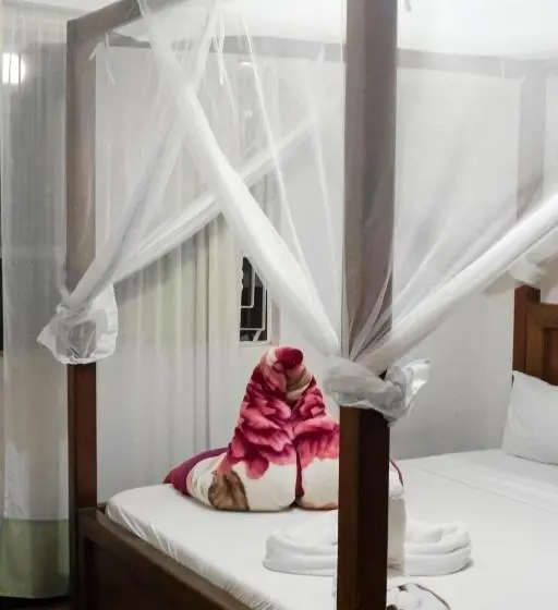 キングサイズベッドのデラックスルーム, Kilimanjaro Vines Retreat Hotel Mdawi