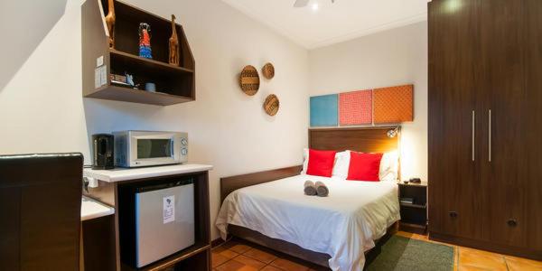 اتاق یک تخته با چشم‌انداز باغ, Africa Beach B&b