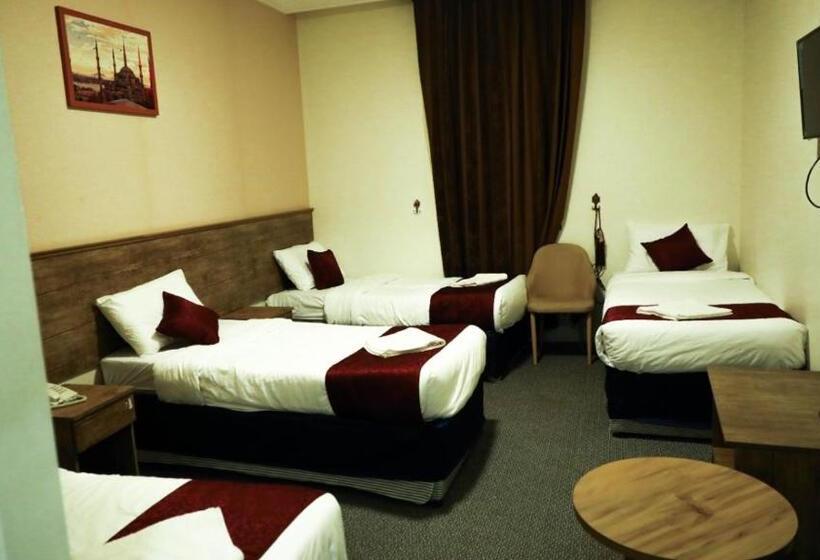 غرفة قياسية رباعية, فندق رتاج الحياة