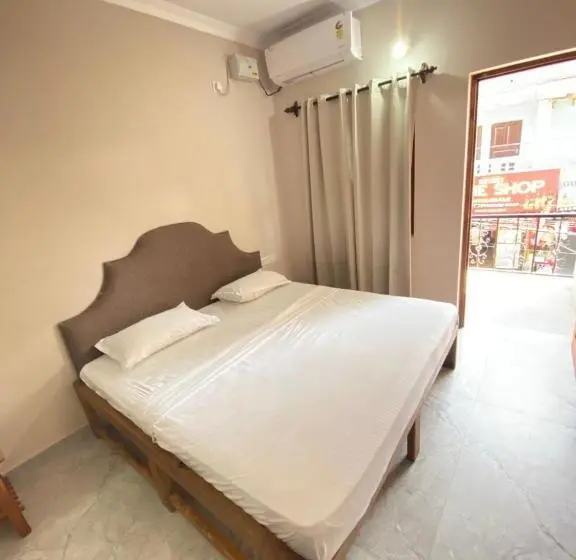 Chambre Quadruple Standard avec Balcon, Ariel Guesthouse