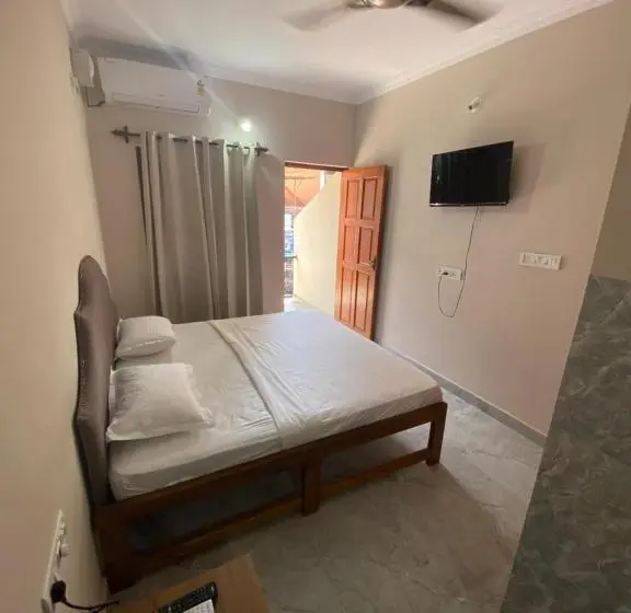 Chambre Quadruple Standard avec Balcon, Ariel Guesthouse