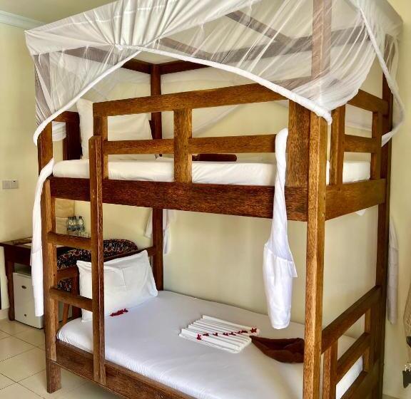 غرفة عائلية, Mahali Zanzibar