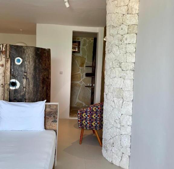 جناح جونيور مطلّ علي البحر, Mahali Zanzibar