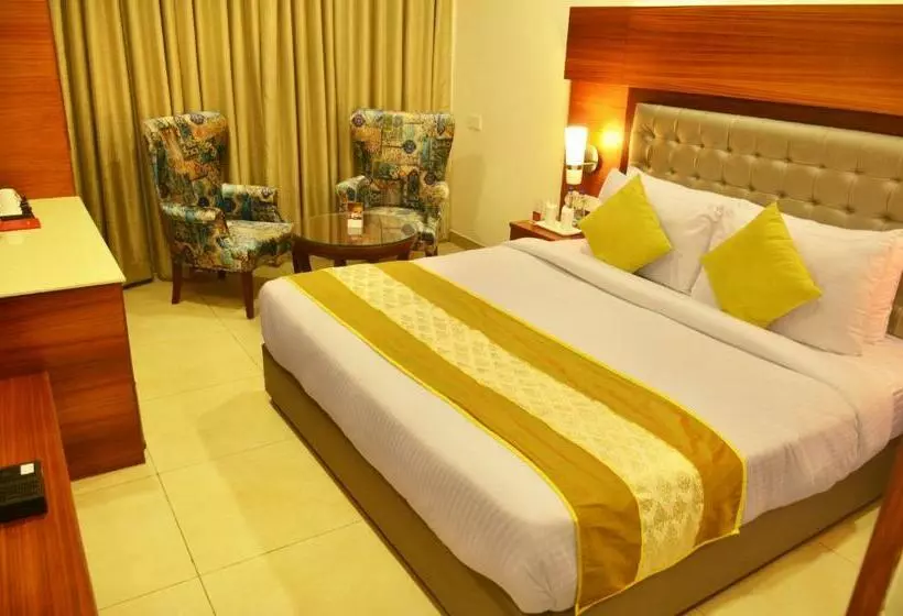キングサイズベッドのデラックスルーム, Mint Hotel Premia Chandigarh, Zirakpur