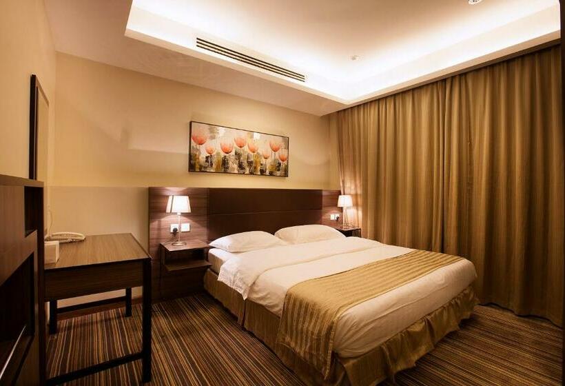 キングサイズベッドのデラックススイート, Grand Lily Hotel Suites