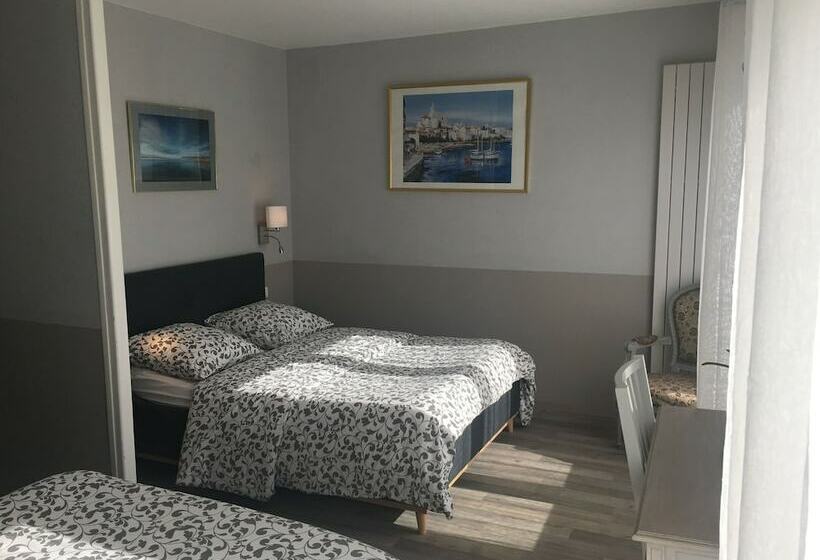 חדר משפחתי, Restaurant Le Commerce