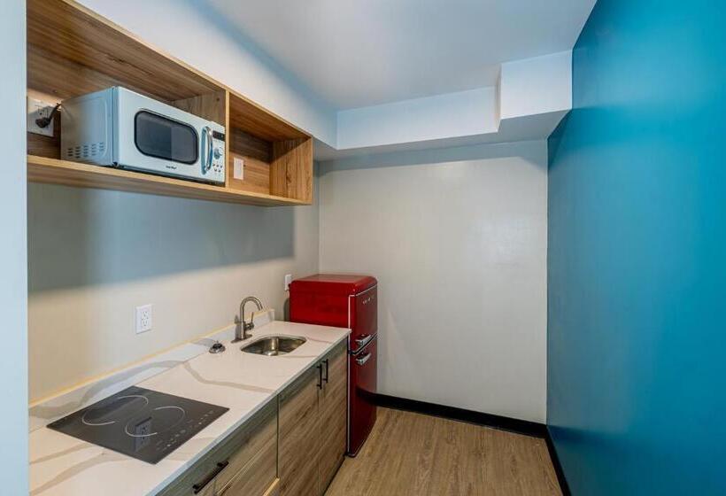 디럭스 룸 킹사이즈 침대, Exclusivo Inn And Suites Near Arlington Stadium