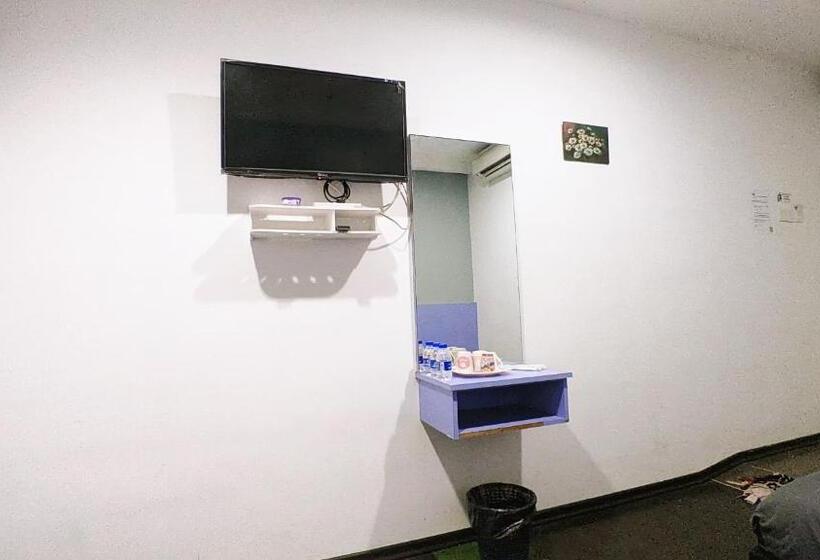 غرفة عائلية, Rg