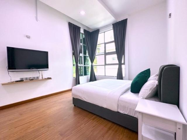 חדר לארבעה סטנדרטי עם נוף לגינה, Teluk Cempedak Seventh Haven