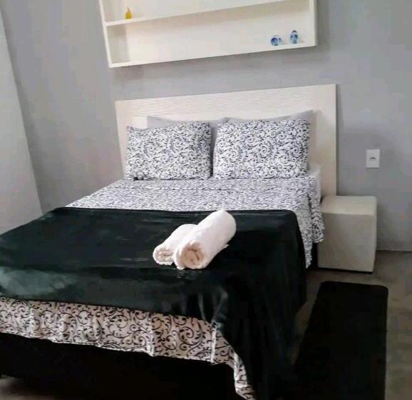 Номер Стандарт, Triboulet Hospedaria