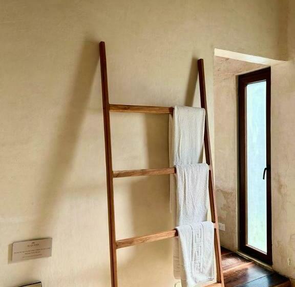 מיטת קינג בסוויטה, Alquimia Hotel Boutique