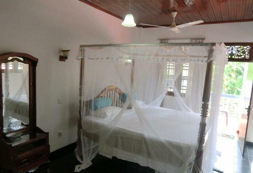 Quarto Estandar, The Oasis Villa