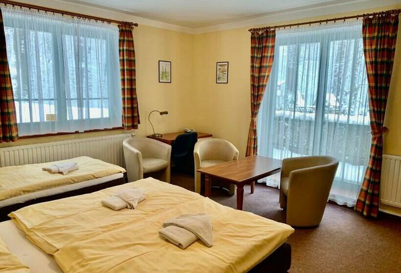 חדר סטנדרט לשלושה, Loucky