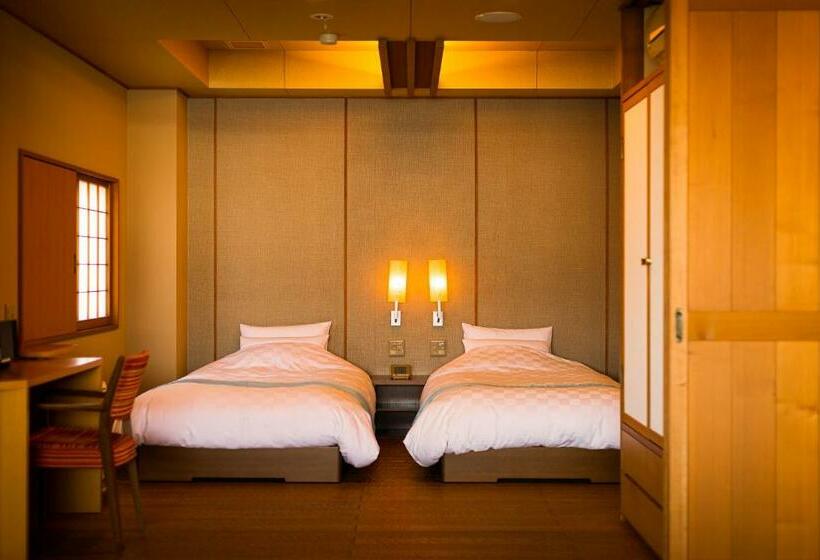 غرفة قياسية مطلّة علي البحر, Migiwaya