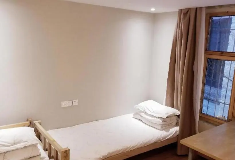 Vuode Makuusalissa, Fengma Feiyang Hostel