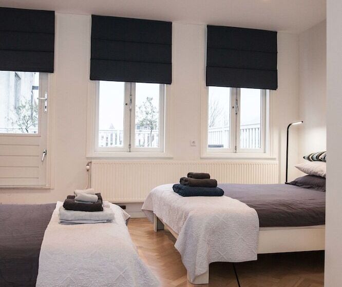 اتاق لوکس چهار تخته, Kuwadro Guesthouse Centrum