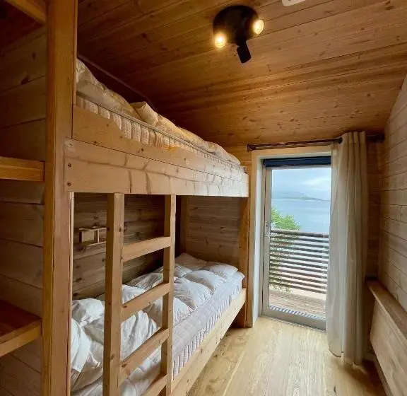 オーシャンビュースタンダードルームバルコニー付き, Ecolodge Båthuset 69nord