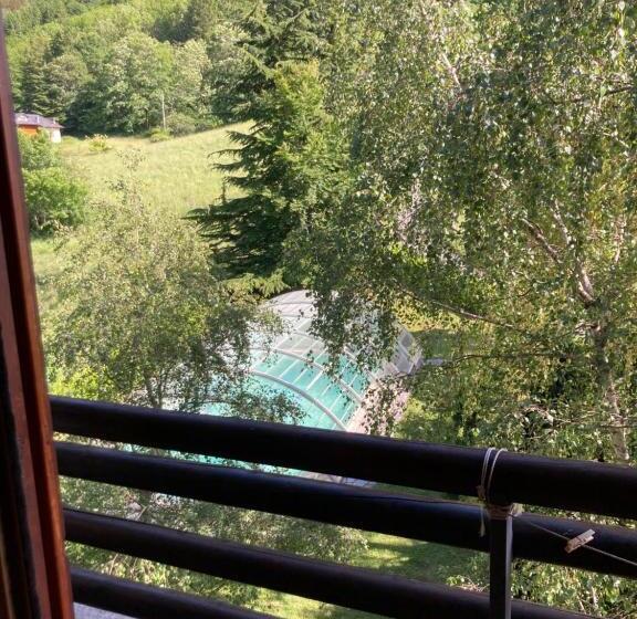 חדר לארבעה סטנדרטי עם נוף לגינה, Agriturismo La Casa Sul Poggio