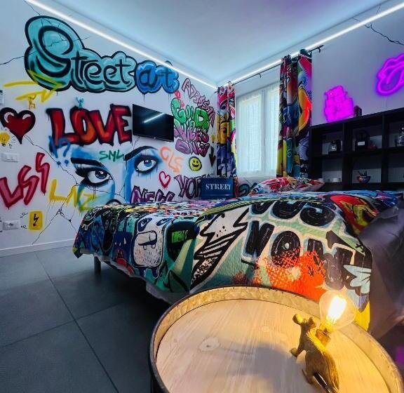 اتاق استاندارد چهارنفره با چشم‌انداز باغ, B&b Rifugio Degli Artisti   Themed Rooms