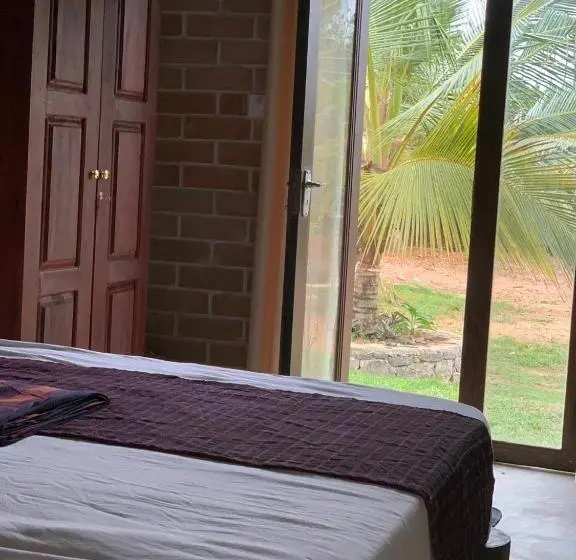اتاق استاندارد با چشم‌انداز باغ, Ashok Villa
