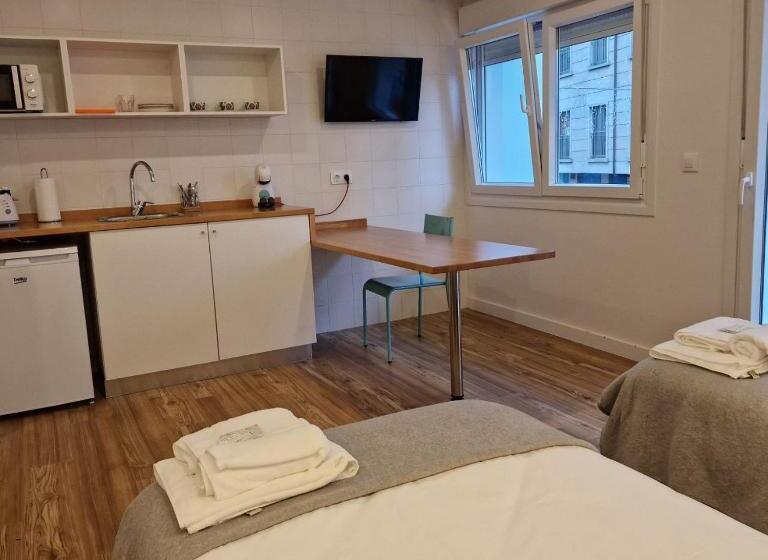 디럭스 트리플 룸, Alojamientos Cando