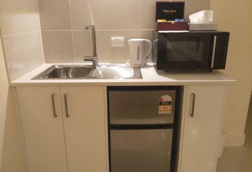 キングサイズベッドのデラックスルーム, Grand Central Serviced Apartments